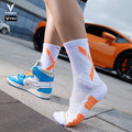 Chaussettes Techniques RAVYKO portées sur terrain
